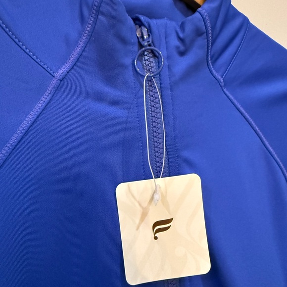 Fabletics Trinity Blue Cold Weather Performance Jacket Size Large NWT - Picture 9 of 13